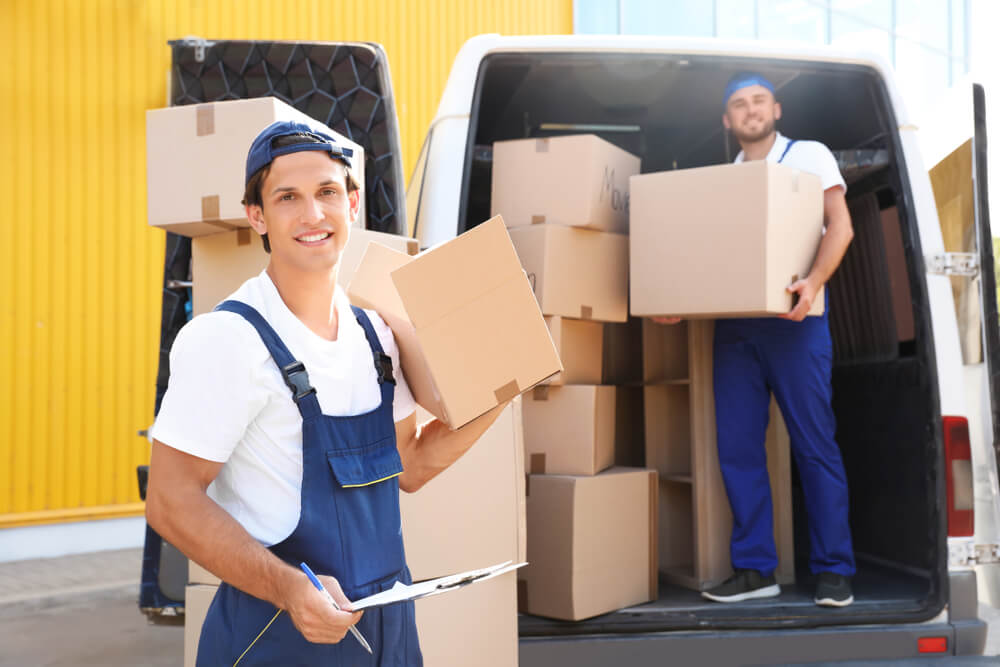 Camden Movers Loading Furniture Into Moving Truck